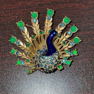 Elegant Gold and Blue Peacock Brooch
